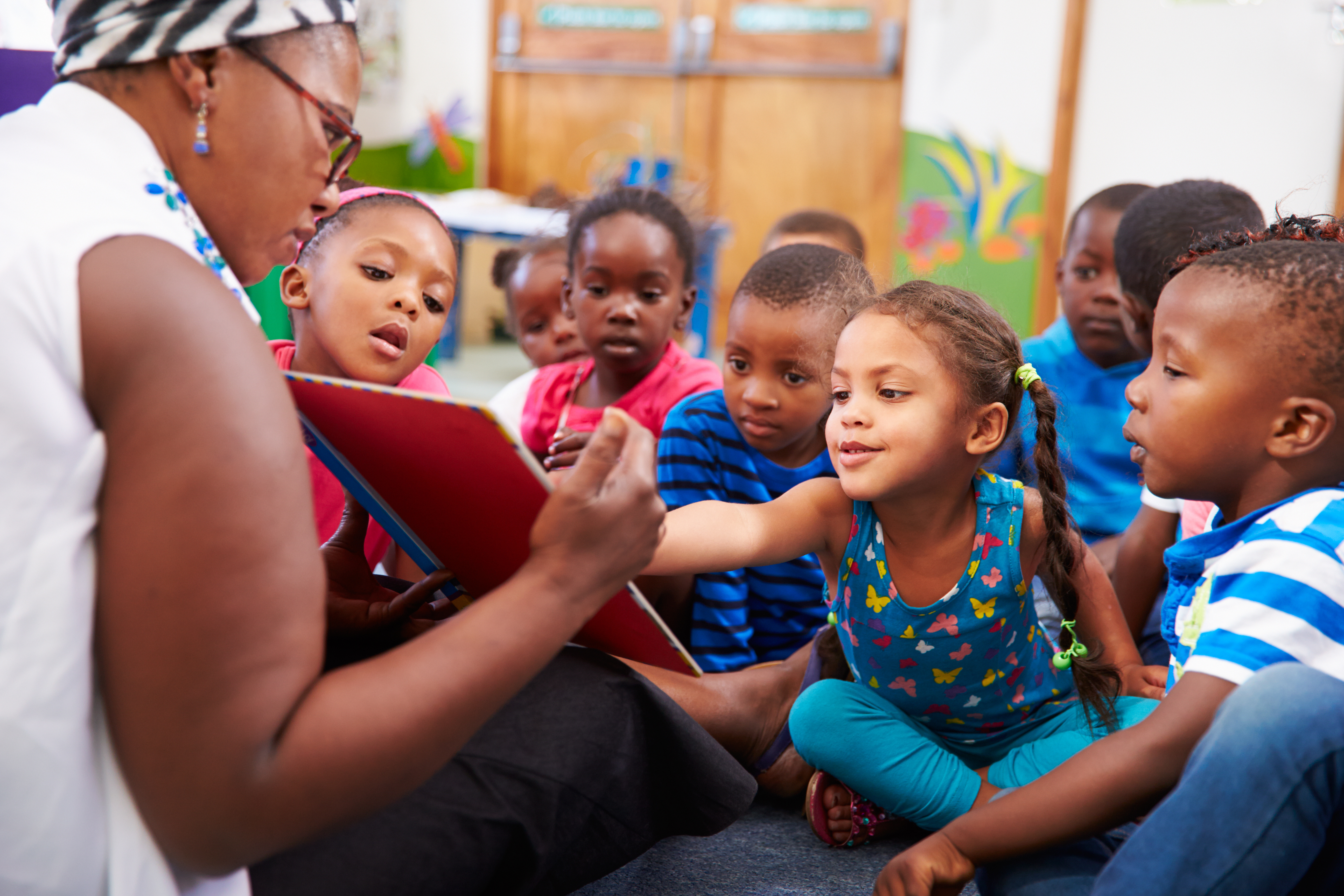 teacher talking to kids