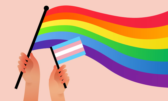 Hands holding the pride flag