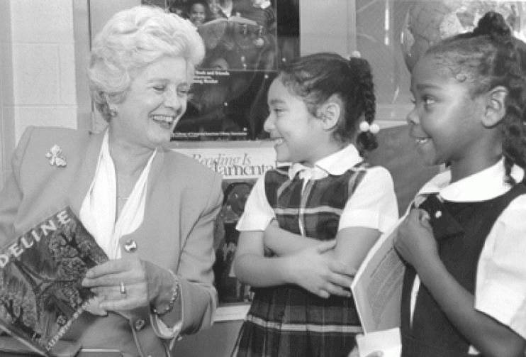 likely early 90s: Ruth Graves sharing a book with two children